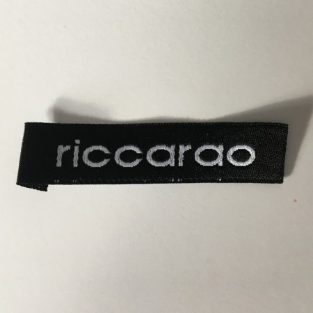 Этикетка жаккардовая вышитая Riccardo 12мм заказная (1000 штук)